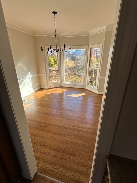 Hardwood into a bay window nook